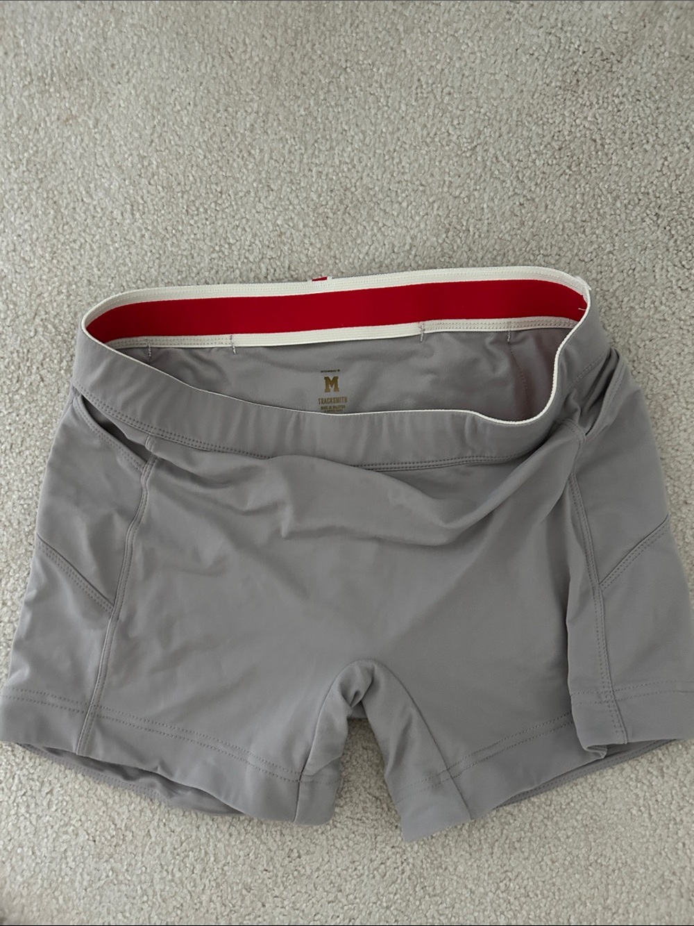 Tracksmith Light Gray Bike Shorts with Red Waistband Accent